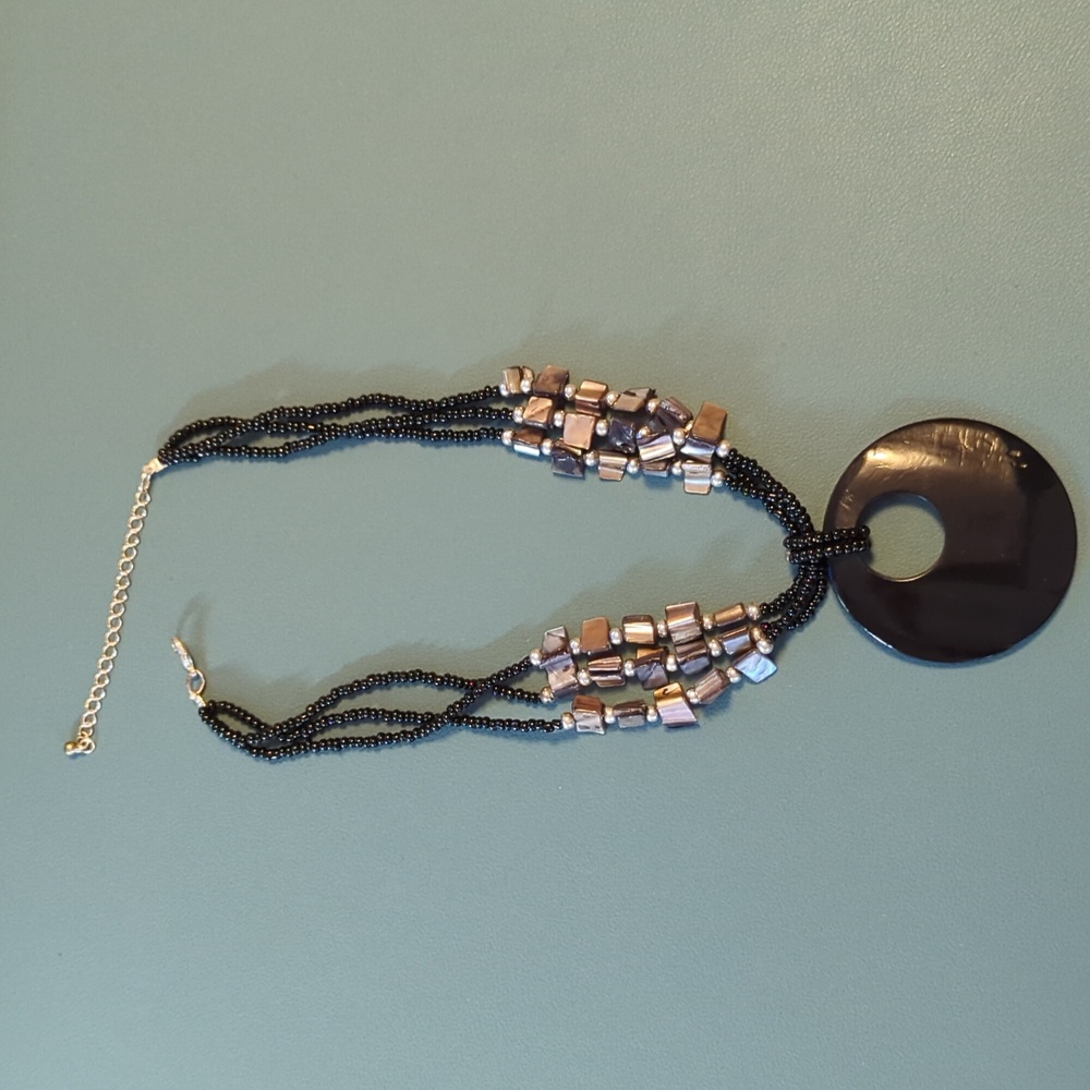 Black necklace large round pendant